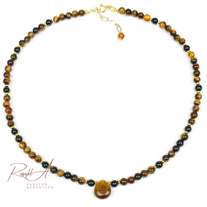 Feiner, vergoldeter Chocker mit kleinen Natursteinperlen und tropfförmiger Anhänger aus Tigerauge. Boho-Chic Touch mit schönem und irisiertem Farbverlauf von gelb bis braun.